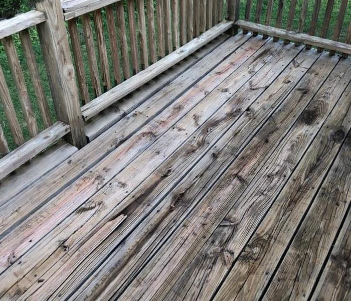 Residential deck after pressure washing